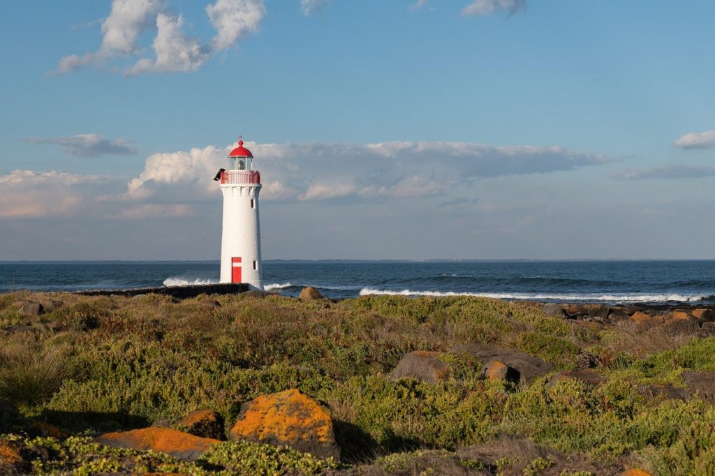 lighthouse, beach, sea-7250229.jpg